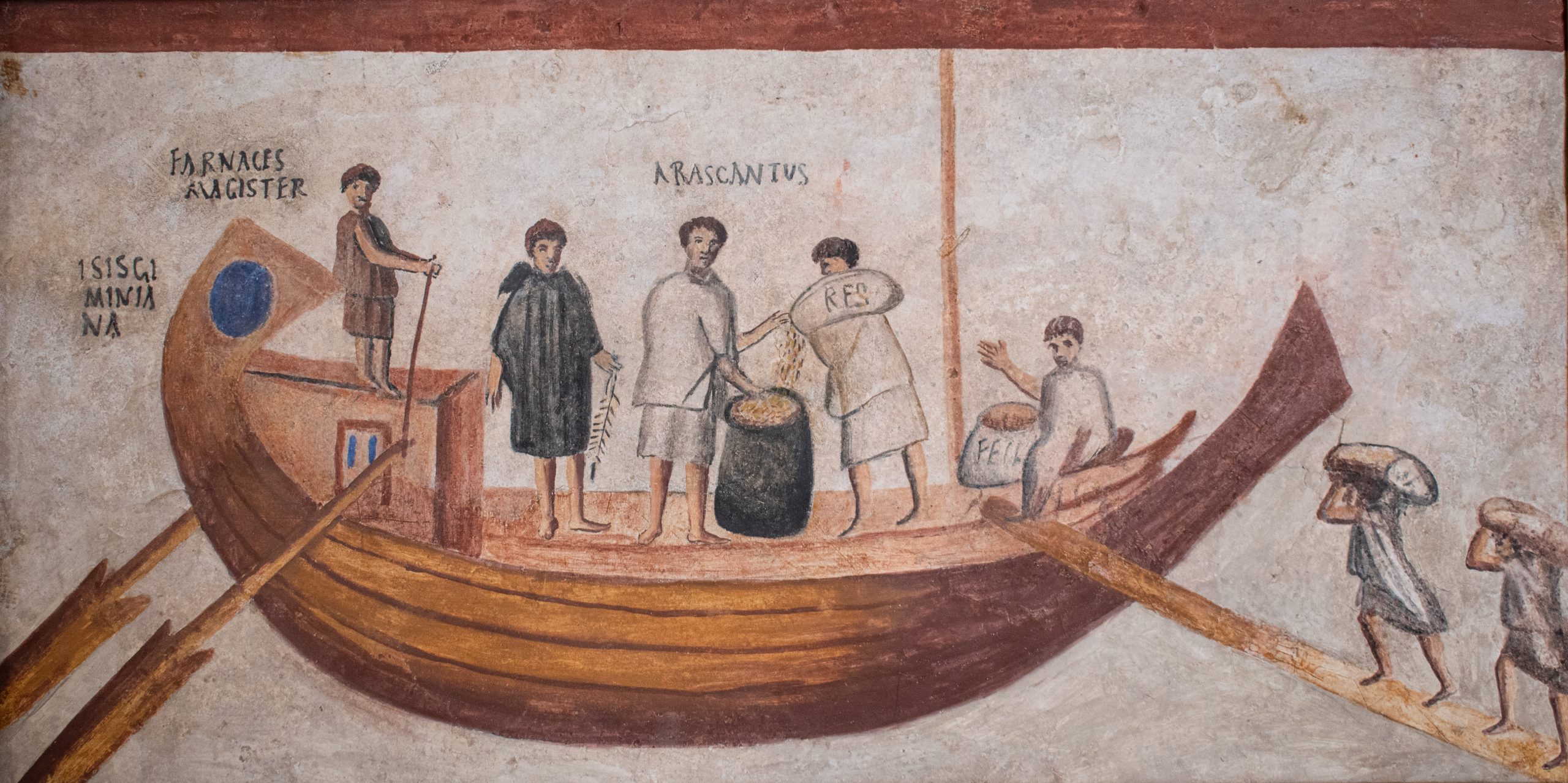 Fresco que muestra la carga de un barco con mercancías.